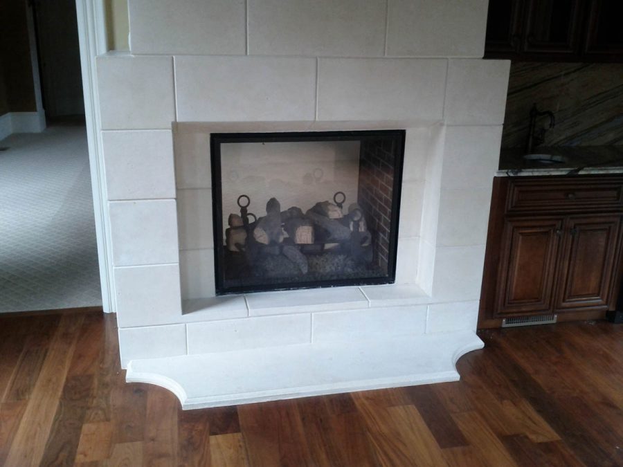modern cast stone fireplace in tile