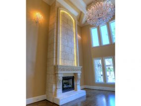 Milania Cast Stone fireplace mantel with stone overmantel